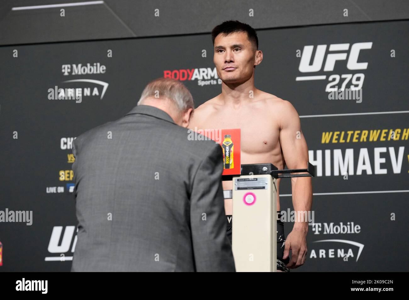 LAS VEGAS, NV - September 9: Alateng Heili  steps on the scale for the official weigh-ins at MGM Grand Garden Arena for UFC 279 - Chimaev vs Diaz - Official Weigh-in on September 9, 2022 in Las Vegas, NV, United States. (Photo by Louis Grasse/PxImages) Stock Photo
