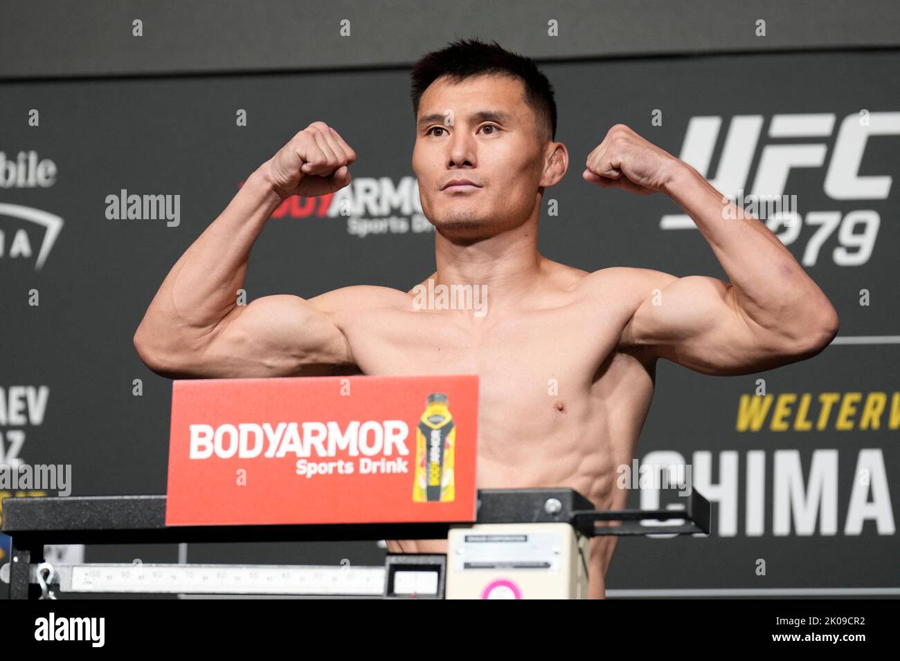 LAS VEGAS, NV - September 9: Alateng Heili  steps on the scale for the official weigh-ins at MGM Grand Garden Arena for UFC 279 - Chimaev vs Diaz - Official Weigh-in on September 9, 2022 in Las Vegas, NV, United States. (Photo by Louis Grasse/PxImages) Stock Photo