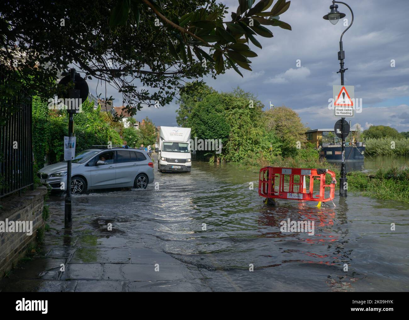 London, England, UK. 10th Sep 2022. Car and truck causing waves in the