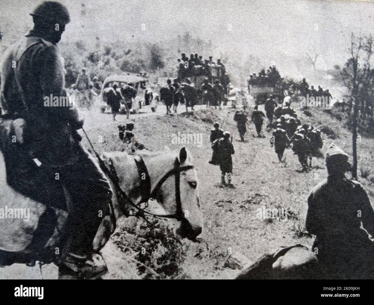 Greek army in retreat after the German invasion of Greece in World War II. The German invasion of Greece, also known as the Battle of Greece or Operation Marita is the attack of Allied Greece by Fascist Italy and Nazi Germany during World War II. The Italian invasion in October 1940, which is usually known as the Greco-Italian War, was followed by the German invasion in April 1941. Stock Photo