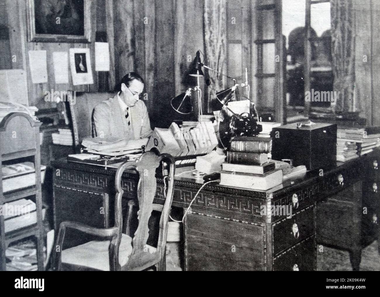 Viceroy of India, Lord Linlithgow at his desk in New Delhi. Victor Alexander John Hope, 2nd Marquess of Linlithgow, KG, KT, GCSI, GCIE, OBE, TD, PC, FRSE (24 September 1887 - 5 January 1952) was a British Unionist politician, agriculturalist, and colonial administrator. He served as Governor-General and Viceroy of India from 1936 to 1943. He was usually referred to simply as Linlithgow. Stock Photo