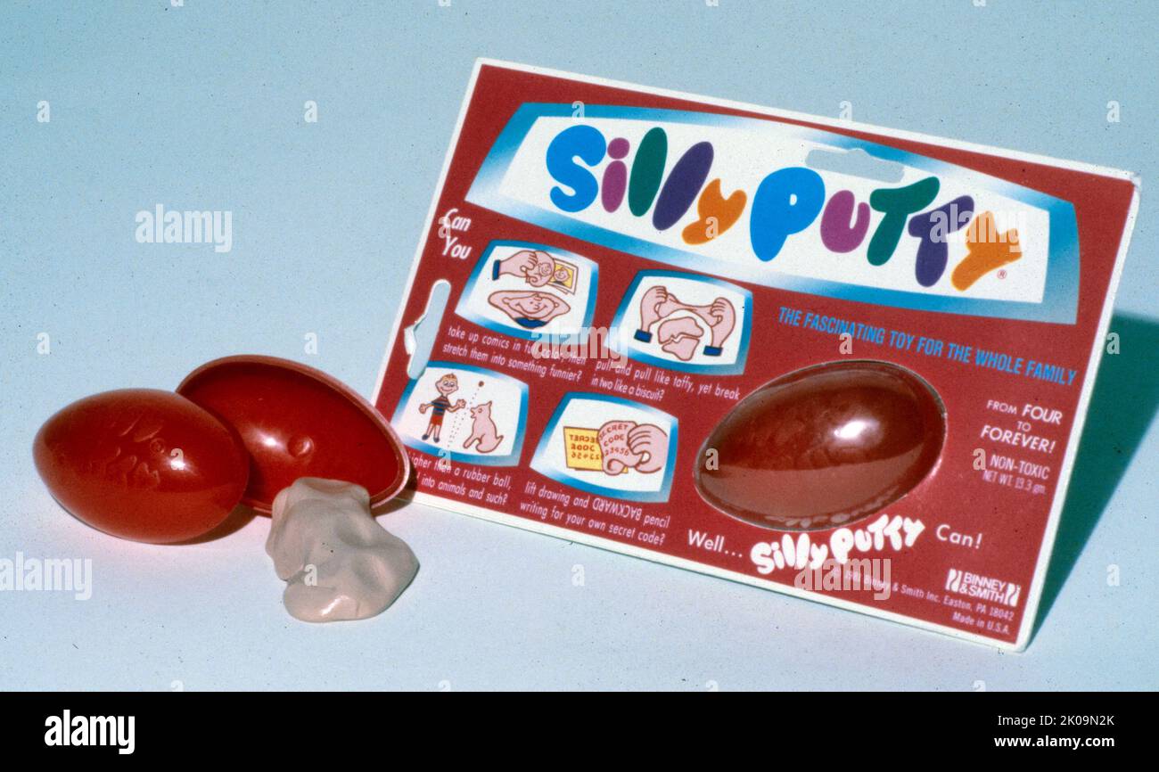 Silly Putty is a toy based on silicone polymers that have unusual physical properties. It bounces, but it breaks when given a sharp blow, and it can also flow like a liquid. It contains a viscoelastic liquid silicone, a type of non-Newtonian fluid, which makes it act as a viscous liquid over a long time period but as an elastic solid over a short time period. It was originally created during research into potential rubber substitutes for use by the United States in World War II. Stock Photo
