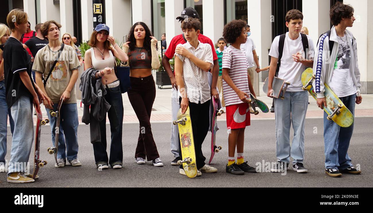 High School students skateboarding in Central London, during a break from school, in the Covid-19, Coronavirus Pandemic. September 2021. Stock Photo