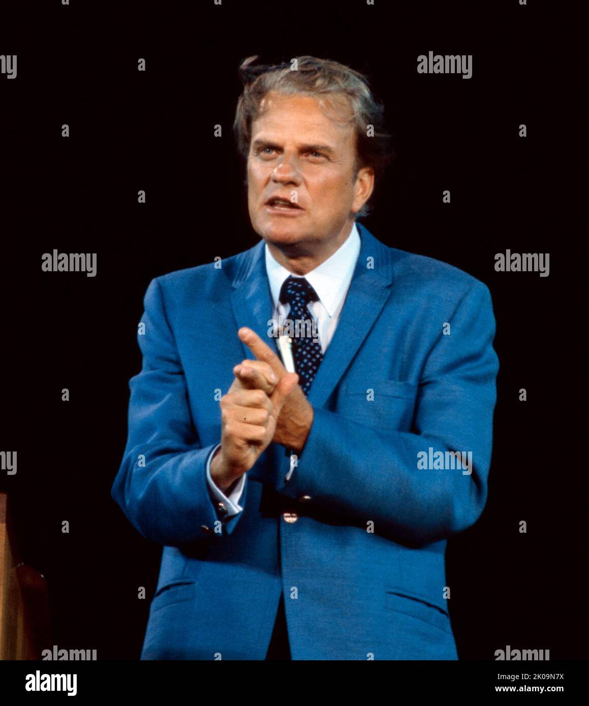 William Franklin Graham Jr. (November 7, 1918 - February 21, 2018) was an American evangelist, a prominent evangelical Christian figure, and an ordained Southern Baptist minister who became well known internationally in the late 1940s. One of his biographers has placed him 'among the most influential Christian leaders' of the 20th century Stock Photo