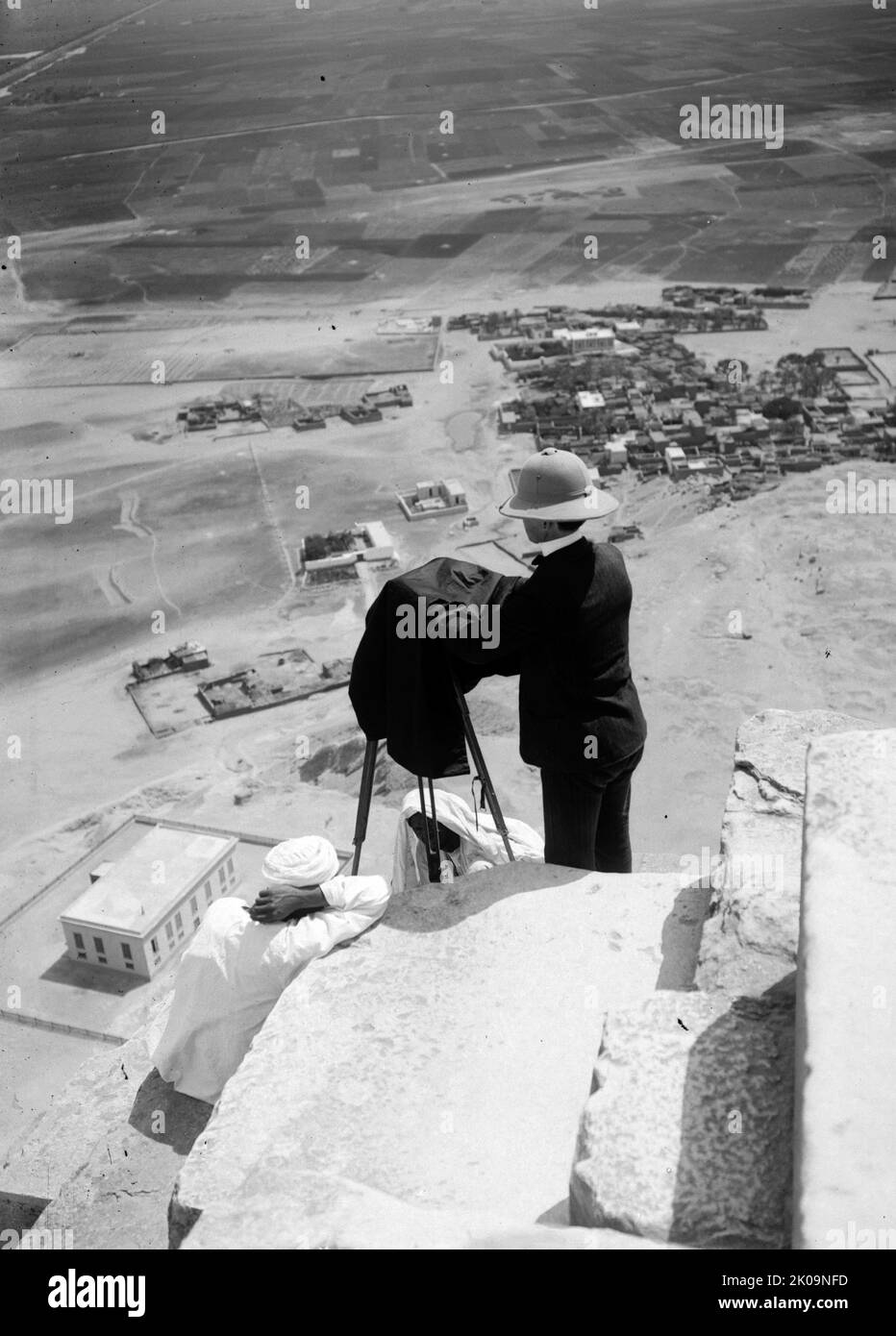 Pyramids of Gizeh. Photographer Lewis Larsson near the top of the Great Pyramid, 1895. Stock Photo