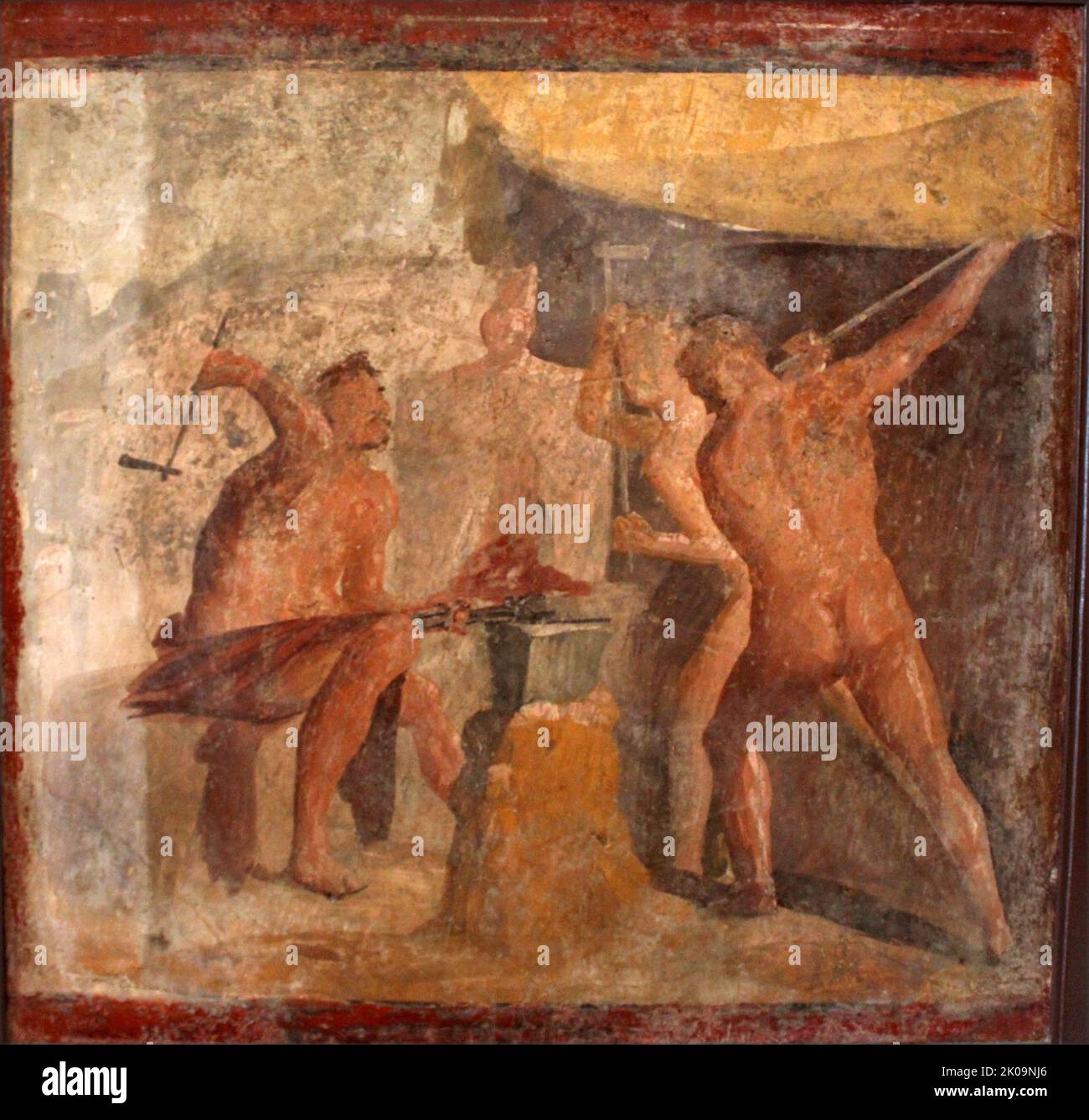 Forge of Hephaistos, Roman fresco. Hephaistos (Vulcan) at his forge, hammering metal on an anvil. He is assisted by a pair of Cyclops. Fresco from the Casa delle Quadrighe (House of the Chariots), in Pompeii, Italy. Roman, Ist century AD. Stock Photo
