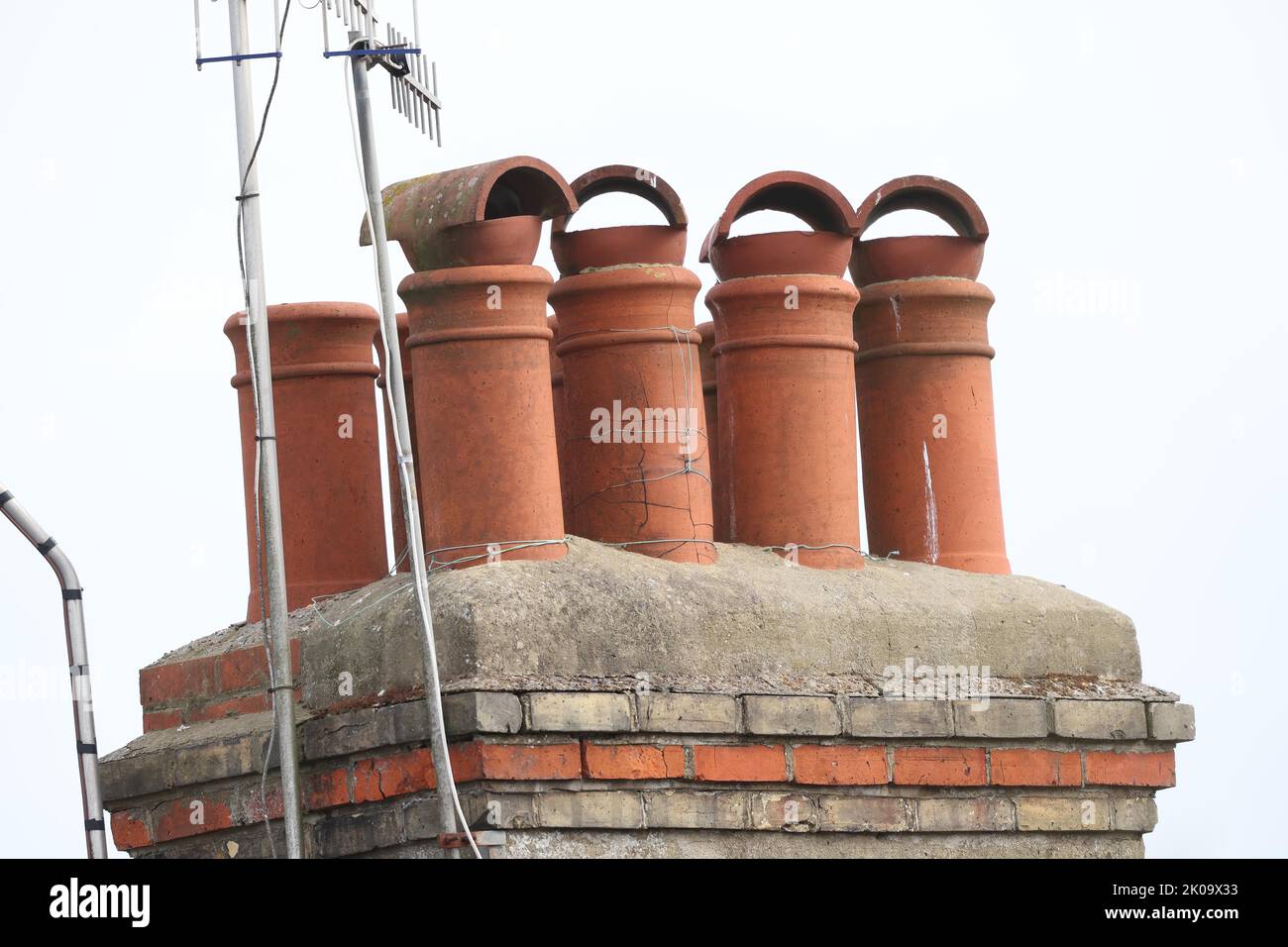 A stack of chimney pots on a terraced house in Brighton Stock Photo
