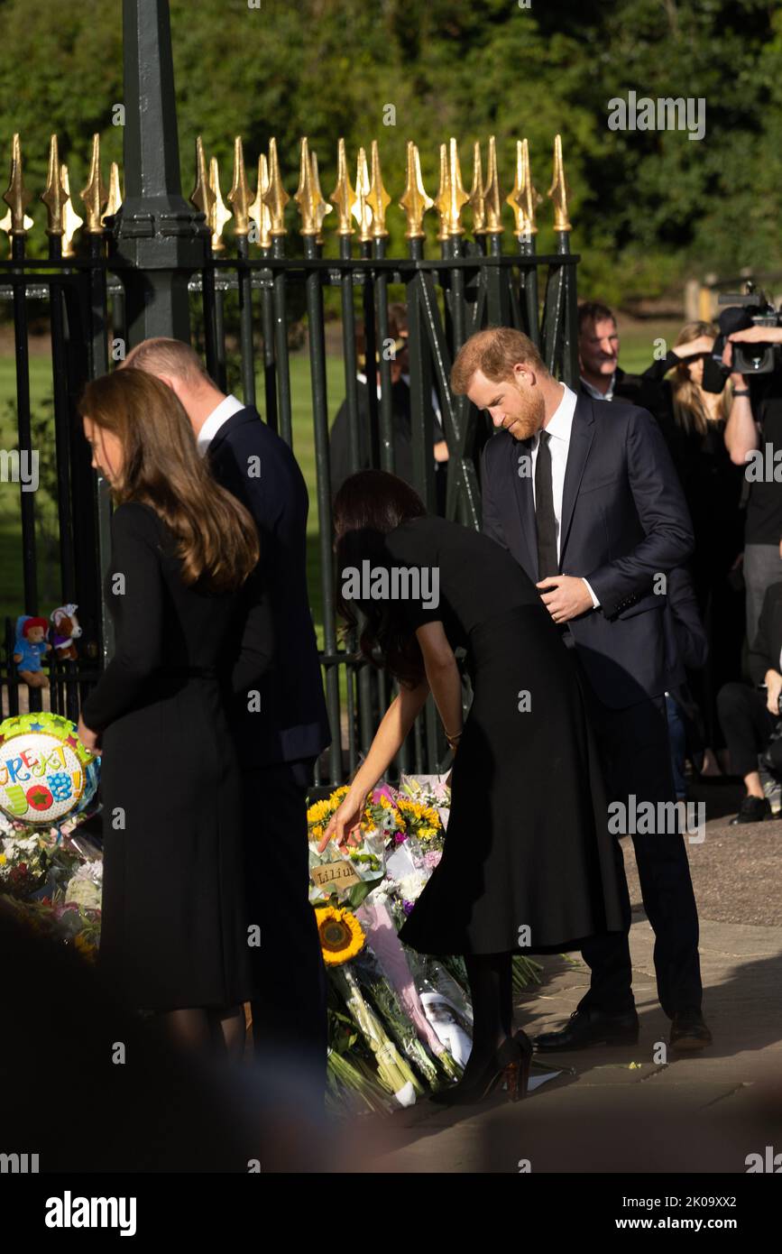 Prince William, Catherine, Prince Harry and Meghan view tributes in Windsor as Queen’s funeral date set Stock Photo