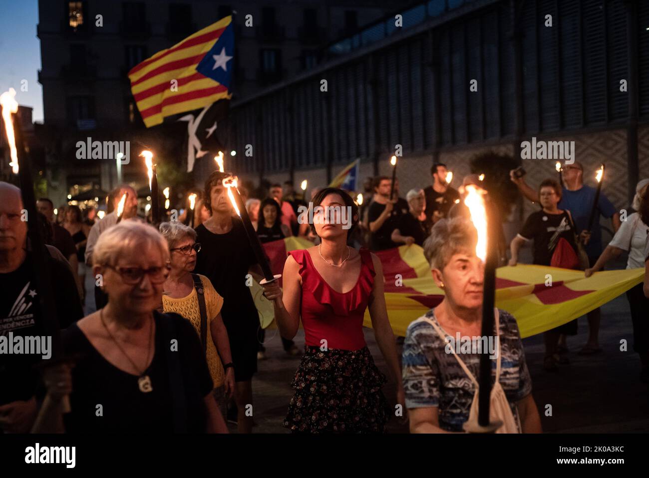 Sept. 10, 2022. Barcelona, Catalonia, Spain: Pro-independence supporters hold torches as they march at El Fossar de les Moreres (historical and symbolic place of the Catalan celebrations in Barcelona) the night before of the Catalonia National Day (La Diada). Credit: Jordi Boixareu/Alamy Live News Stock Photo