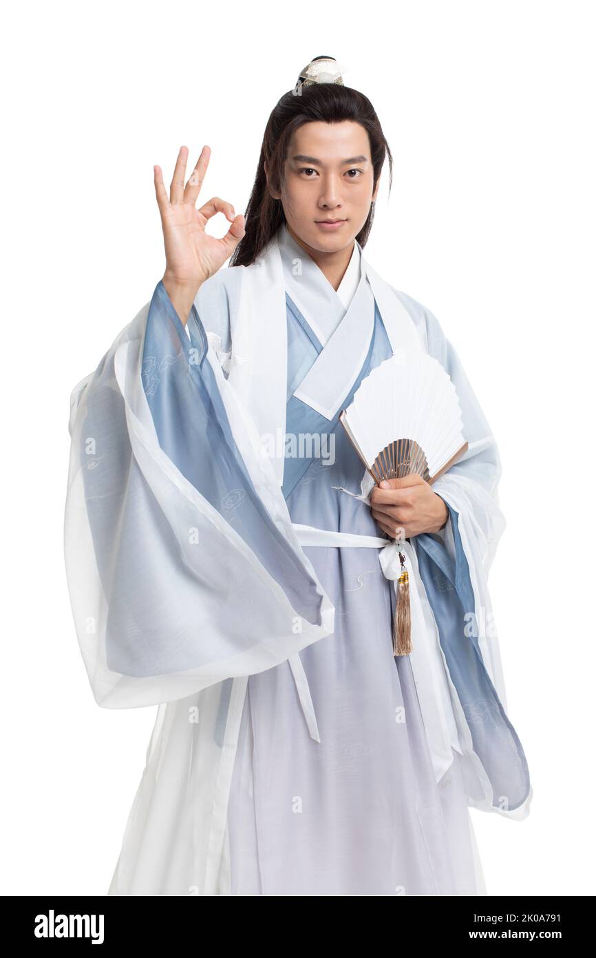 Young Chinese man in ancient costume doing OK sign Stock Photo - Alamy