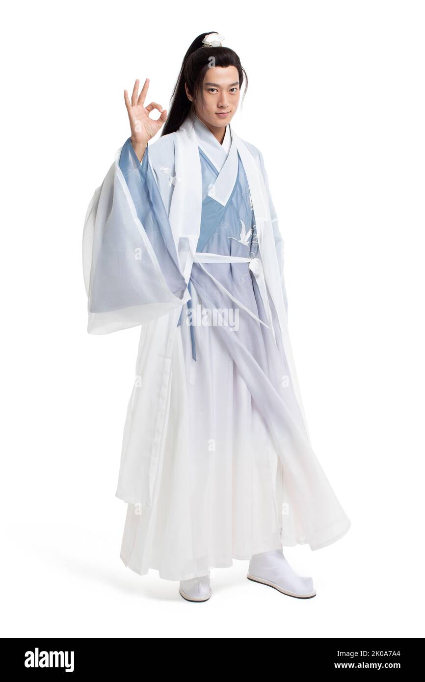Young Chinese man in ancient costume doing OK sign Stock Photo
