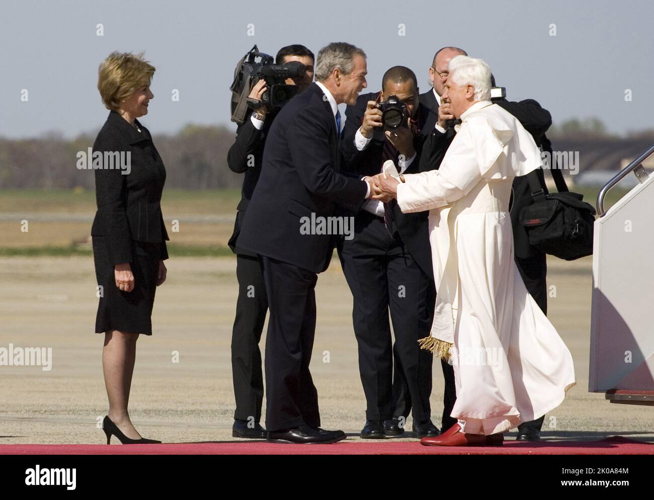 President George W. Bush and Laura Bush greet Pope Benedict XVI on his arrival at Andrews Air Force Base, Maryland, 2008 Stock Photo