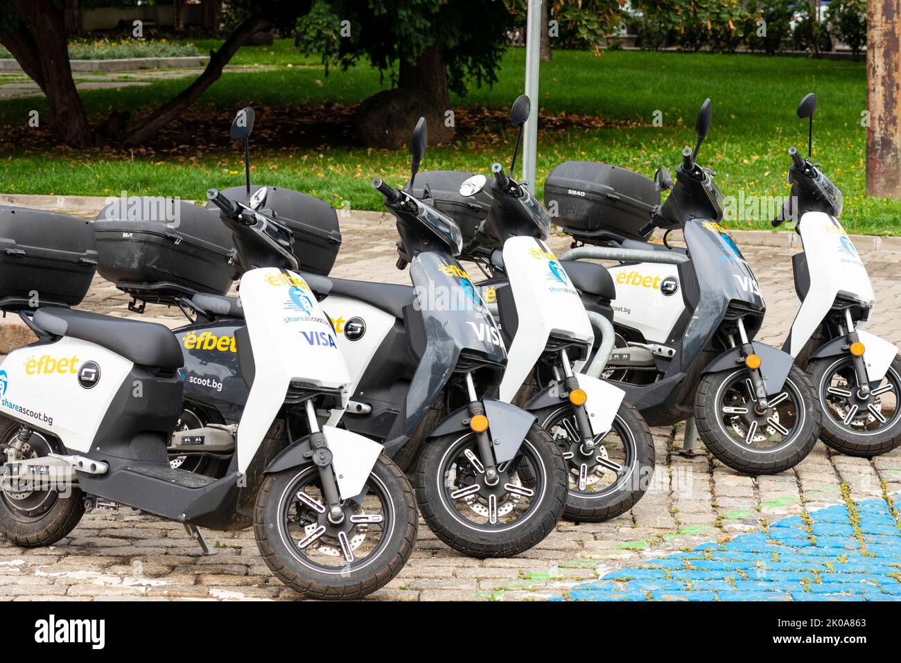 Electric scooters for hire by Shareascoot parked in Sofia, Bulgaria, Eastern Europe, Balkans, EU Stock Photo