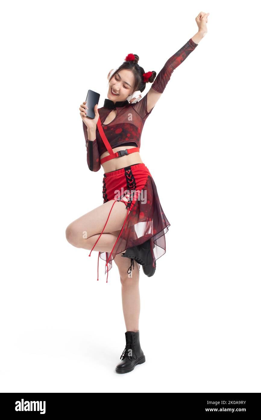 Headphones listening phone asian Cut Out Stock Images & Pictures - Alamy