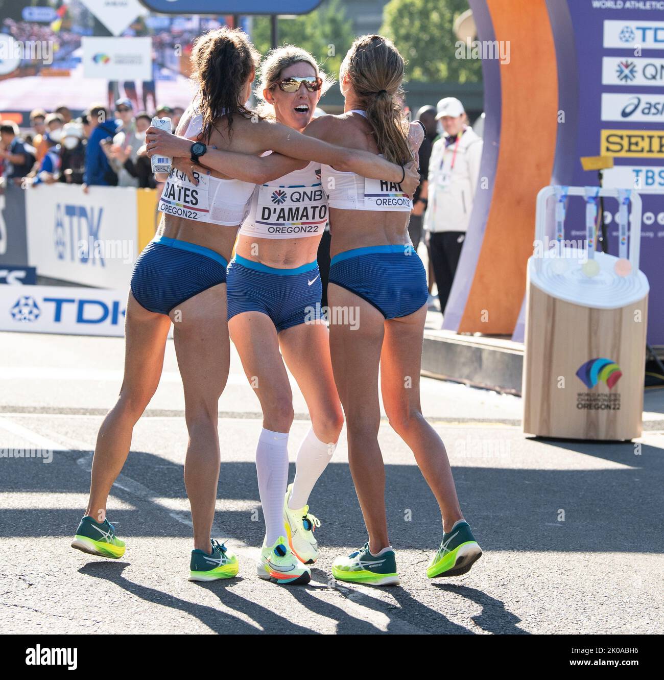 Emma Bates, Sara Hall and Keira D'Amato of the USA celebrate after