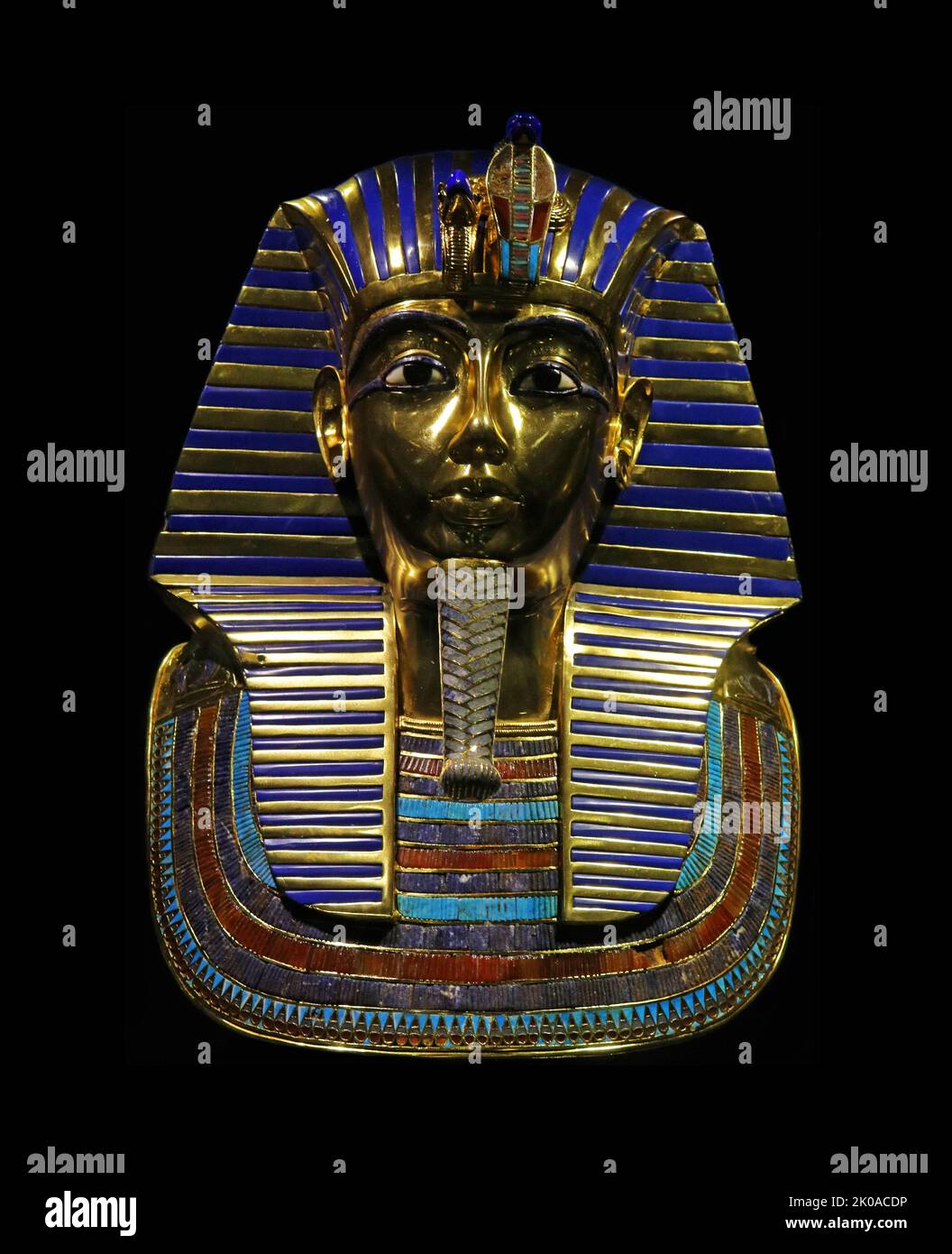 The mask of Tutankhamun is a gold mask of the 18th-dynasty ancient Egyptian Pharaoh Tutankhamun (reigned 1334-1325 BC). It was discovered by Howard Carter in 1925 in tomb KV62 in the Valley of the Kings, and is now housed in the Egyptian Museum in Cairo. The death mask is one of the best-known works of art in the world and a prominent symbol of ancient Egypt Stock Photo
