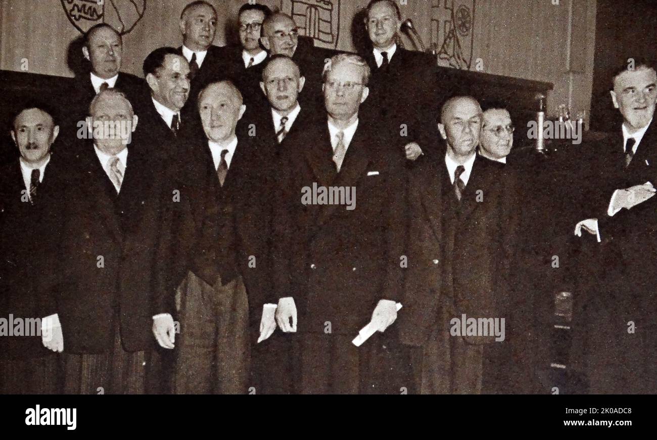 Members of the first German Cabinet since World War II, 1949. Photograph shows (left to right), front row: Herr Anton Storch, ? A Labour (Christian Democrat); Professor Ludwig Erhard, Economic Affairs (Christian Democrat); Dr. Konrad  I Adenauer, Chancellor (Christian Democrat); Herr Franz Blucher, Vice-Chancellor and Minister for E.R.P. (Free Democrat); Herr Jakob Kaiser, All-German Questions (Christian Democrat); Dr. Hans Lukaschek, Refugees (Christian Democrat). Second row: Herr Heinrich Hellwege, Without Portfolio (German Party); Dr. Wilhelm Nicklas, Food and Agriculture (Christian Democr Stock Photo