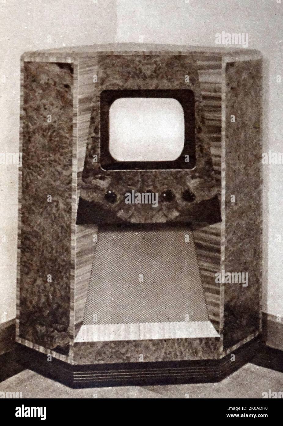 A specially designed television receiver made by R. N. Fitton Ltd. and priced at £105 including tax, made to fit into the corner of a room, 1949 Stock Photo