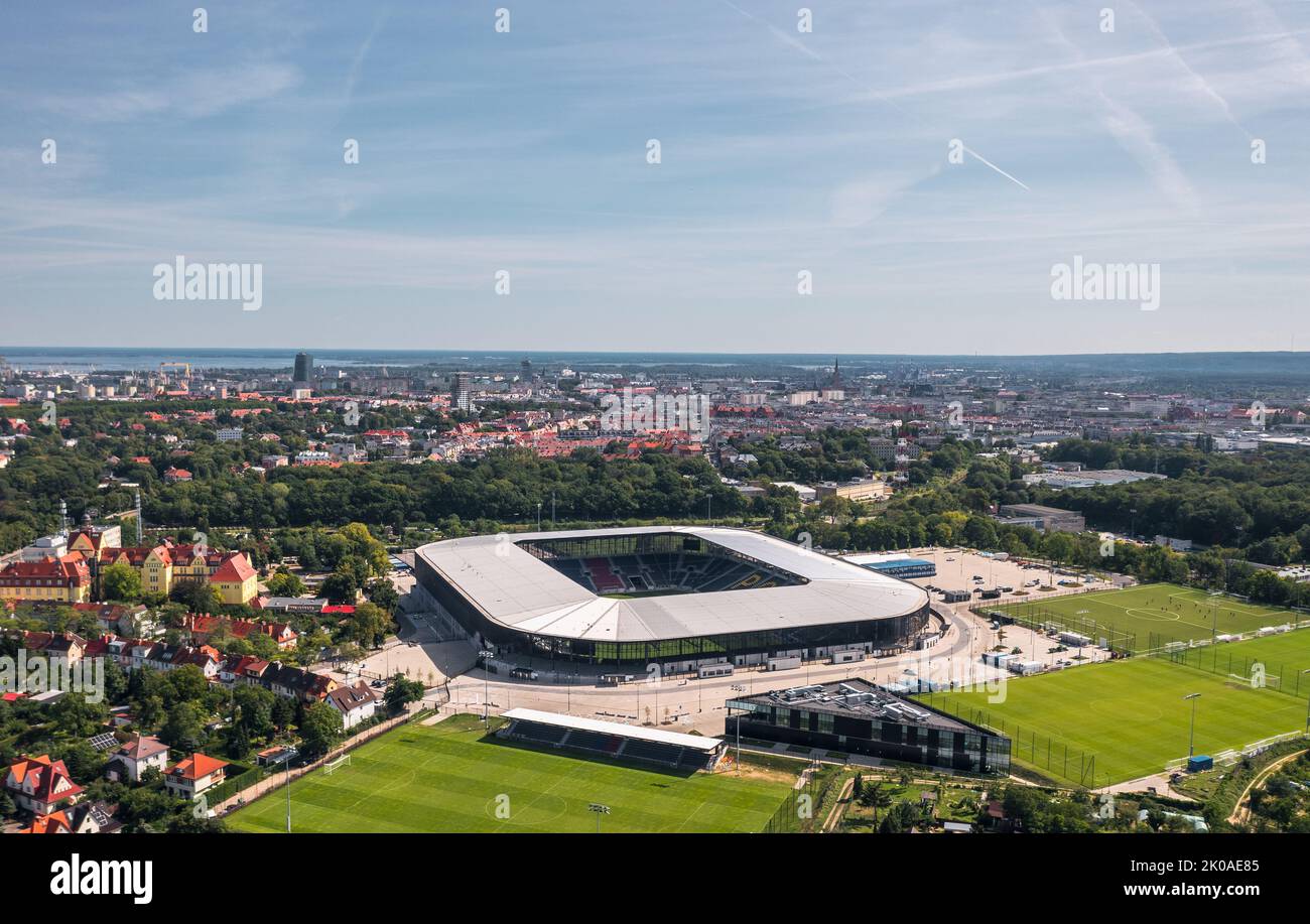 Aerial panoramic summer view over city stadium (Stadion Miejski im. Floriana Krygiera), home ground of Pogoń Szczecin football club. Szczecin, Poland Stock Photo