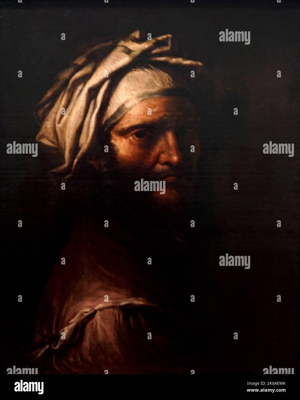 Head of a man wearing a Turban, by Salvator Rosa (1615-1673). Painted circa 1651. Oil on canvas. Salvator Rosa created this painting as a memento for his friends in Florence after leaving the city following an eight-year stay. He painted a series of imagined heads, which he sent back to his friends in the city. The man in this portrait resembles Rosa himself Stock Photo