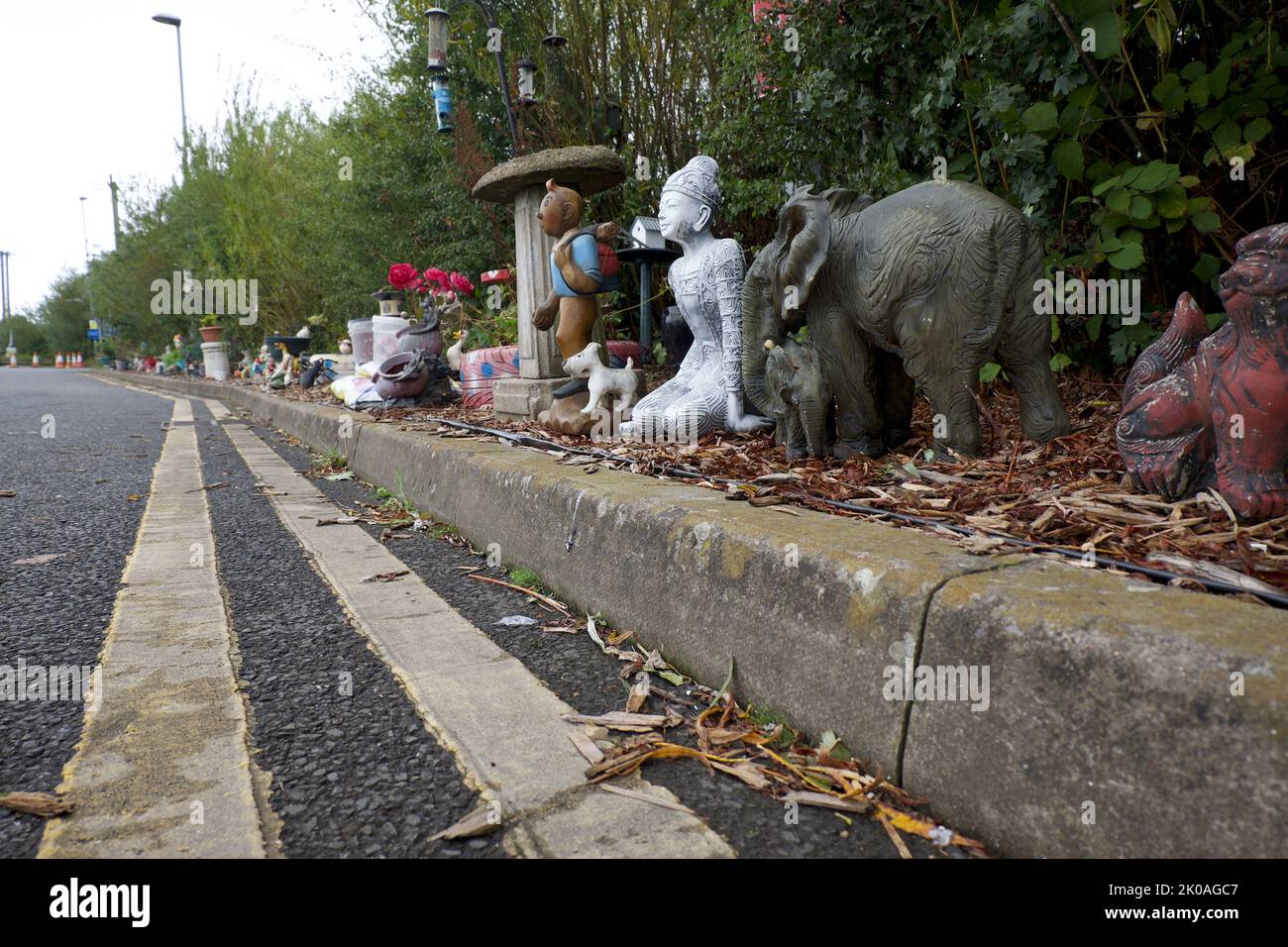 St Austell Cornwall England 09 05 2022 Cornwall recycling centre amateur entomologist display for discarded garden ornaments Stock Photo