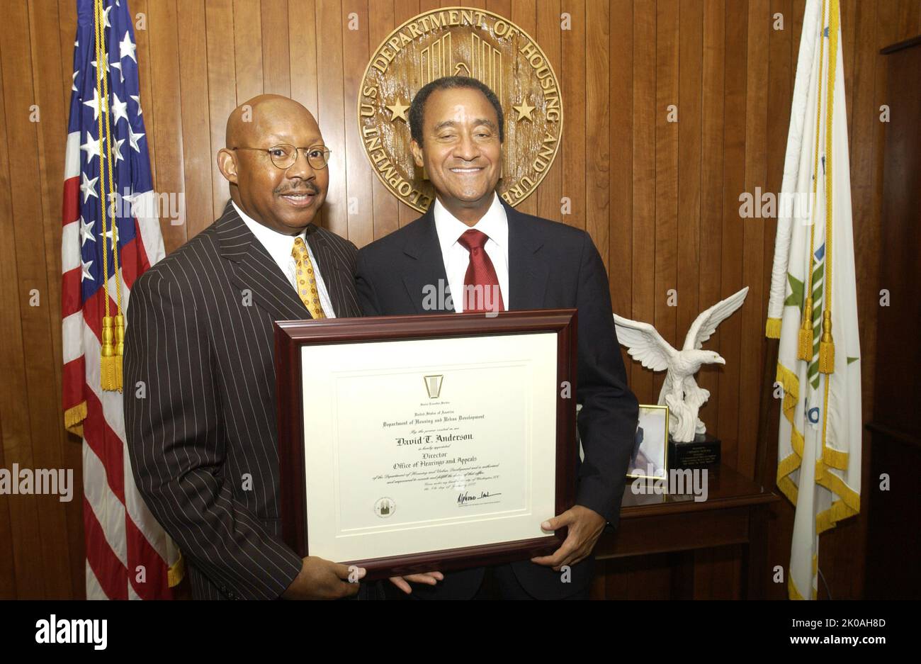 Secretary Alphonso Jackson with David Anderson - Judge David Anderson, newly-appointed Director of the Office of Hearings and Appeals, visiting Secretary's office for meeting with, and receipt of appointment certificate from, Secretary Alphonso Jackson at HUD Headquarters. Secretary Alphonso Jackson with David Anderson Subject, Judge David Anderson, newly-appointed Director of the Office of Hearings and Appeals, visiting Secretary's office for meeting with, and receipt of appointment certificate from, Secretary Alphonso Jackson at HUD Headquarters. Stock Photo