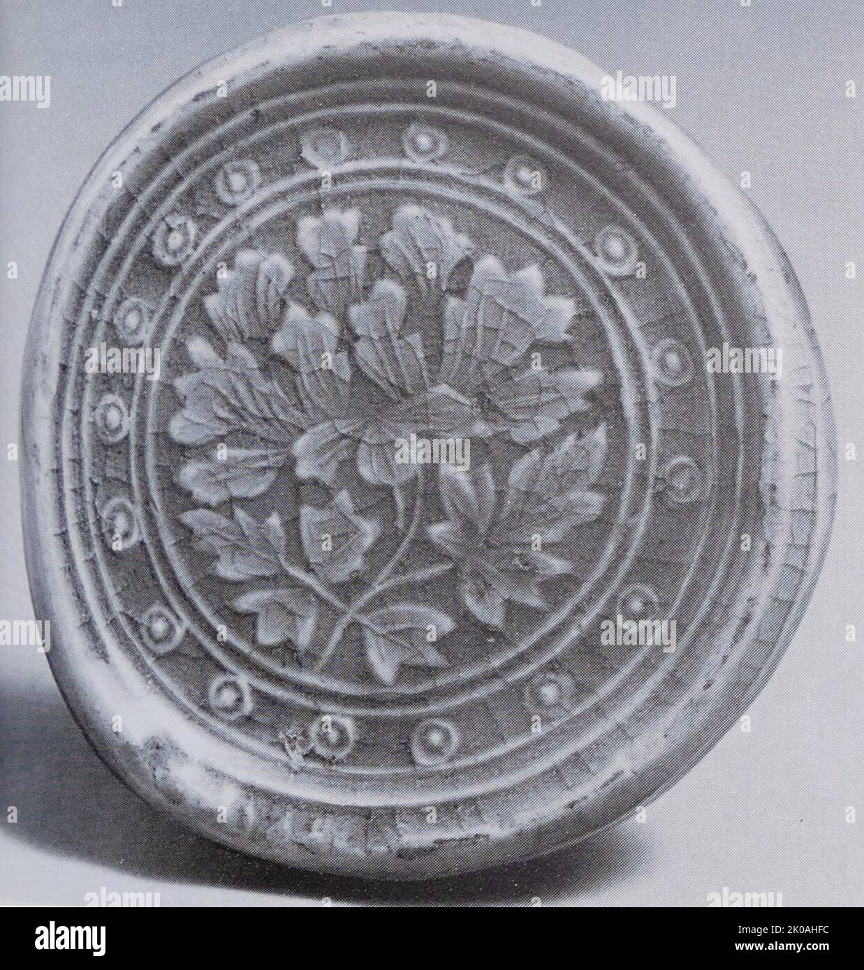 Plate from 12th century Koryeo Dynasty, Korea . Incised celadon. From