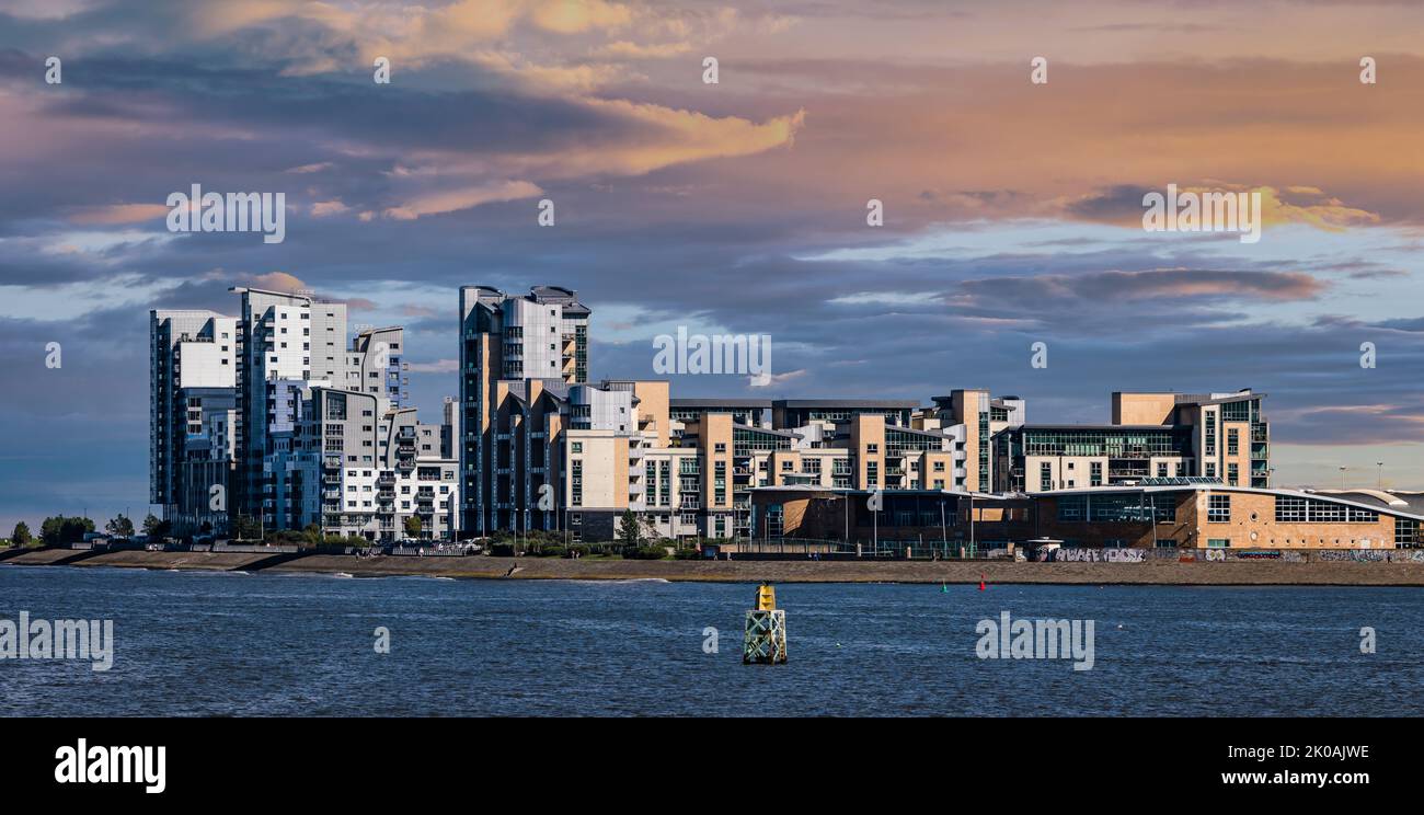 Modern high rise apartment buildings at Platinum Point, Western Harbour, Edinburgh, Scotland, UK seen across Firth of Forth Stock Photo