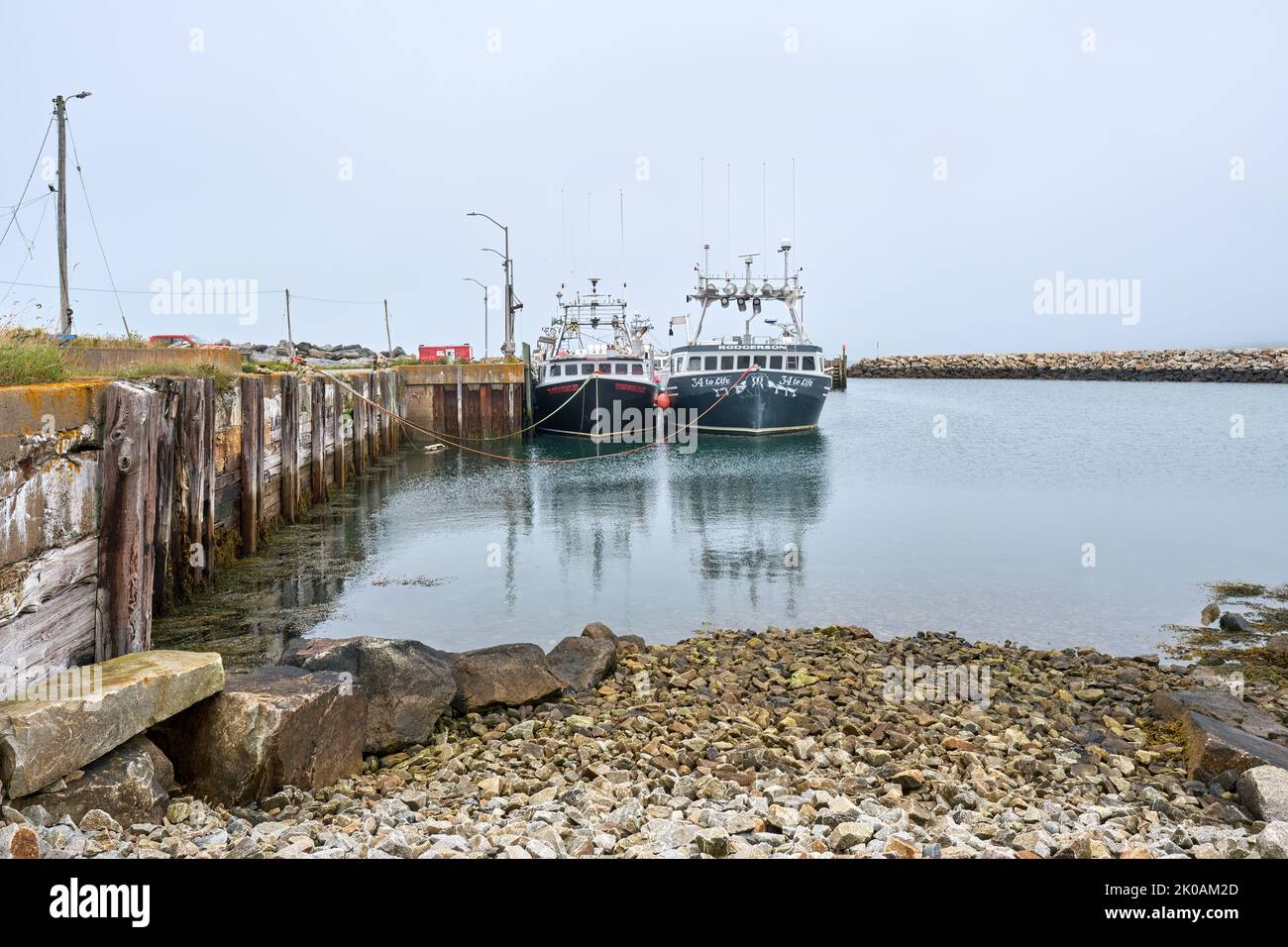 Fishing boats moored in the safe harbour of Sandford Wharf Nova Scotia. Stock Photo