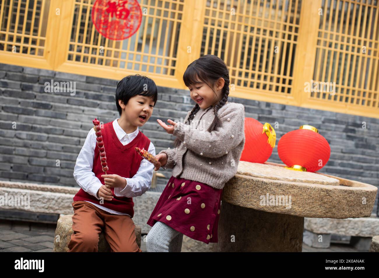 Happy Chinese Sibling Eating Candied Haws Stock Photo Alamy Happy Chinese Sibling Eating Candied Haws Stock Photo Alamy