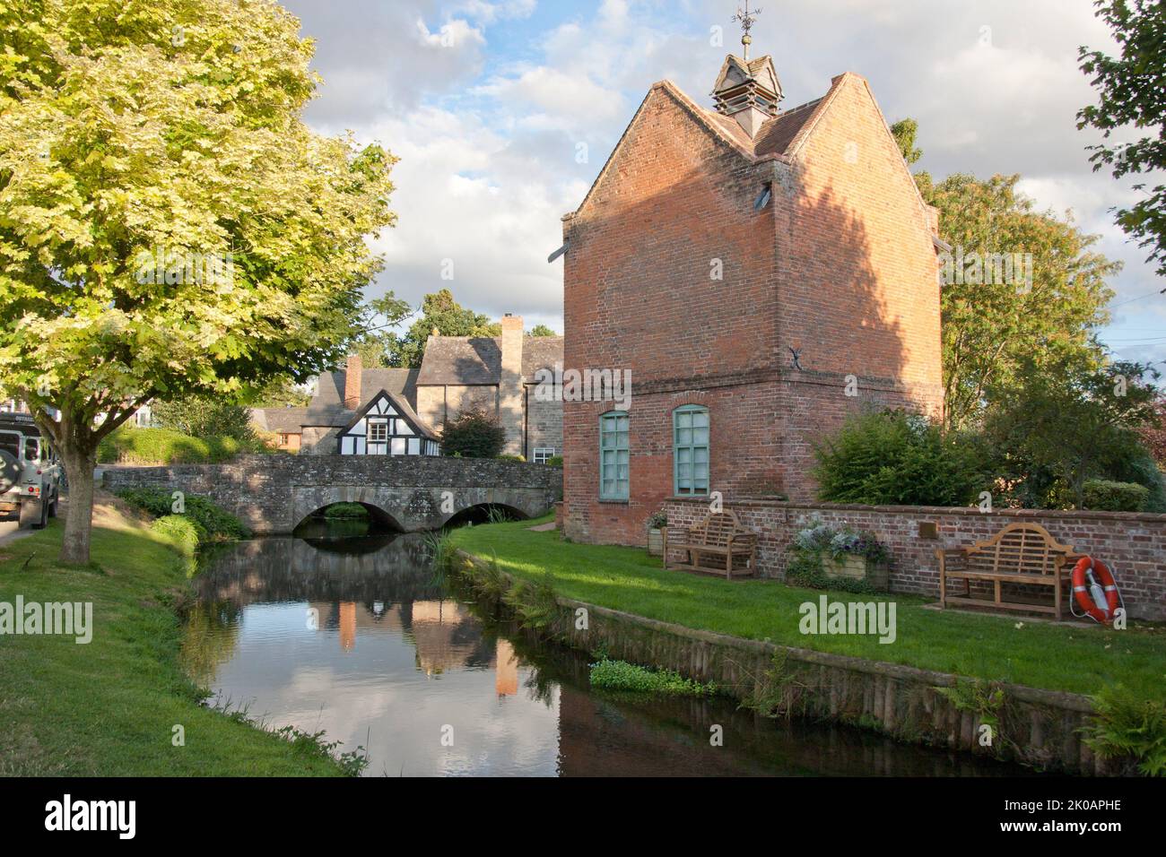Eardisland picturesque village on the River Arrow with the old dovecote, now a shop, nr Leominster, Herefordshire, England Stock Photo