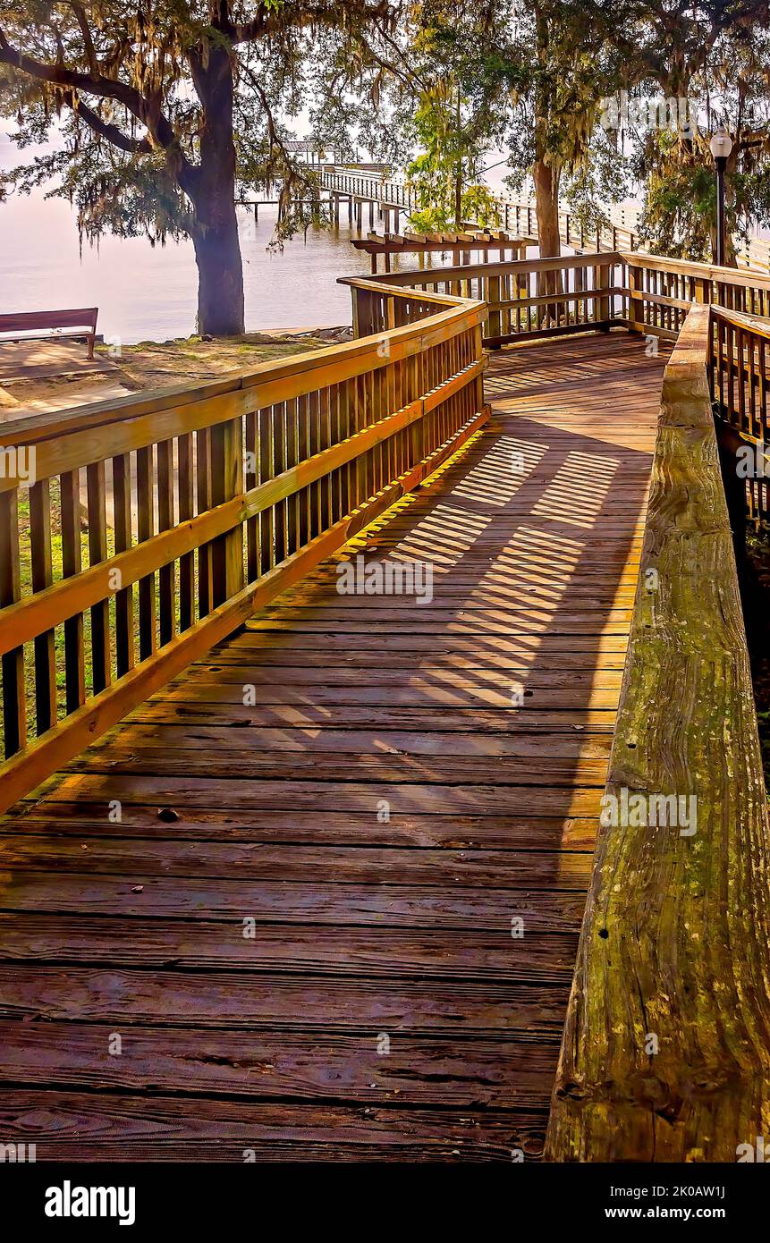 The May Day Park boardwalk and pier offers a view of Mobile Bay, Sept. 8, 2022, in Daphne, Alabama. The park was founded in 1887. Stock Photo