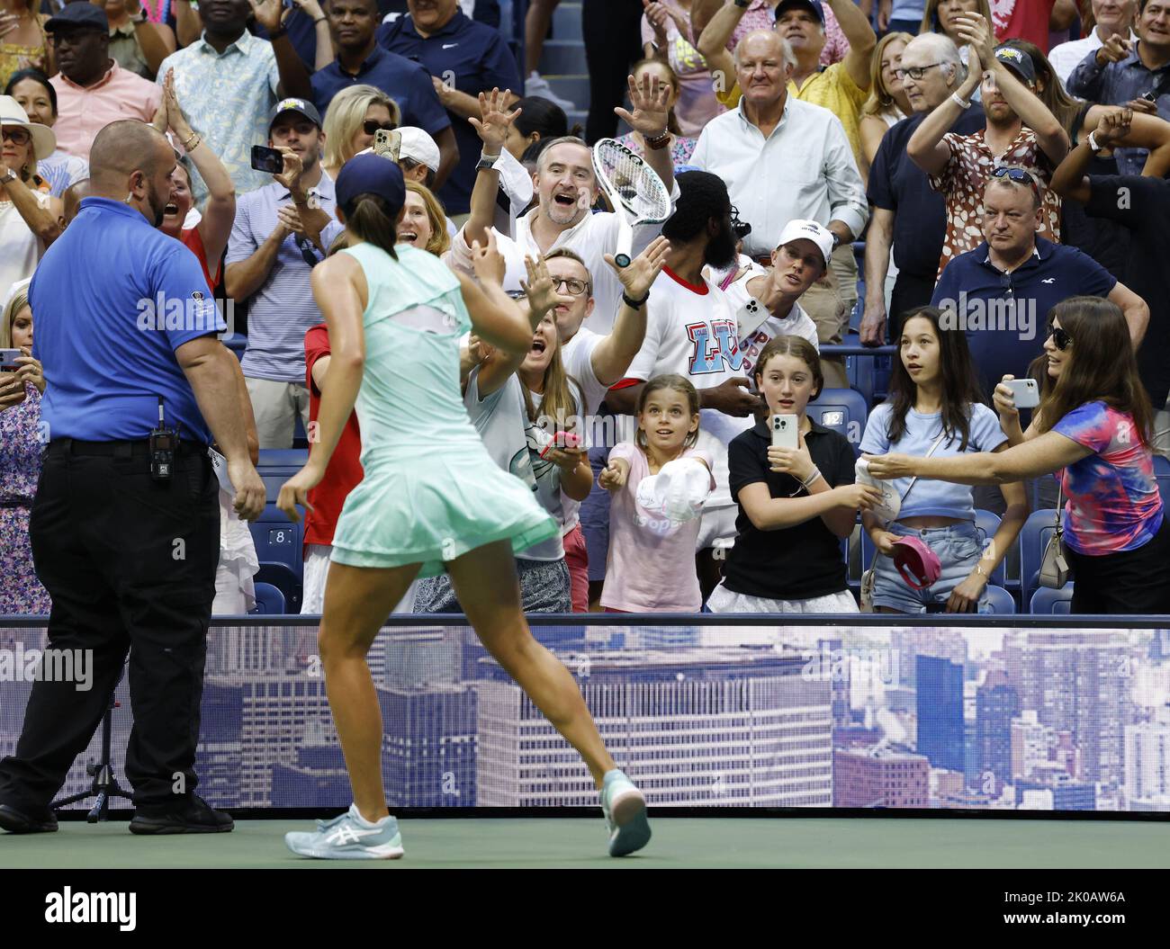 Serena Williams throws her racket after losing the second set tiebreak to  Victoria Azarenka of Belarus in the Woman's Final in Arthur Ashe Stadium at  the U.S. Open Tennis Championships at the