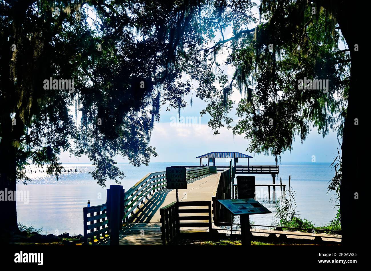 The May Day Park pier offers a view of Mobile Bay, Sept. 8, 2022, in Daphne, Alabama. The park was founded in 1887 and is one of 13 parks in Daphne. Stock Photo