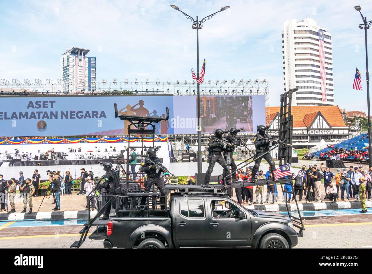 Malaysia Army's anti-terrorist special force commandos on assault vehicle during 65th Malaysia National Day Parade in Kuala Lumpur, Malaysia. Stock Photo