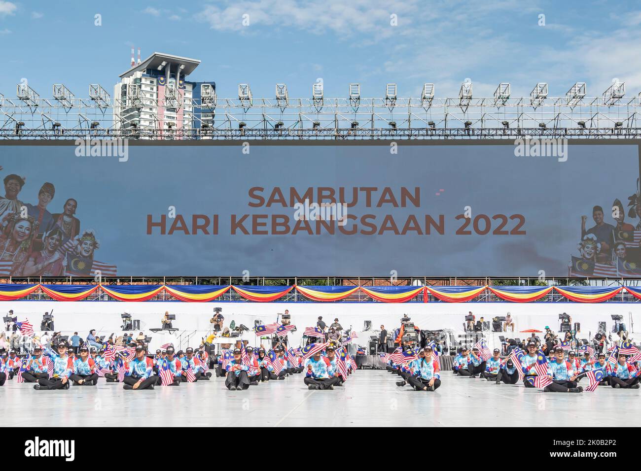 Malaysian dance performers waving Malaysia's flags during rehearsal practise for 65th Malaysia National Day celebration in Kuala Lumpur, Malaysia. Stock Photo