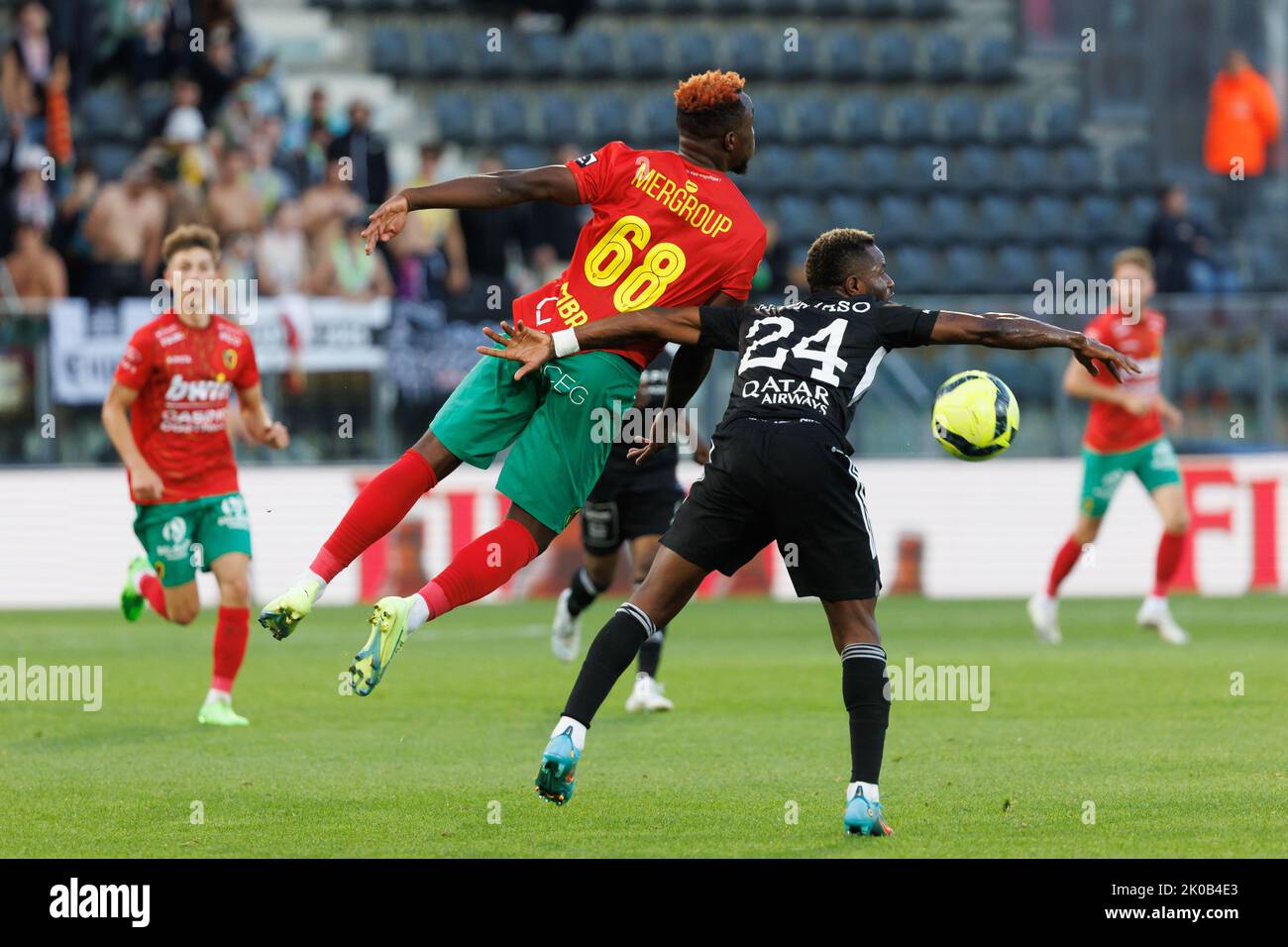 Oostende's Thierry Ambrose and Eupen's Mubarak Wakaso fight for the ball during a soccer match between KV Oostende and KAS Eupen, Saturday 10 September 2022 in Oostende, on day 8 of the 2022-2023 'Jupiler Pro League' first division of the Belgian championship. BELGA PHOTO KURT DESPLENTER Stock Photo