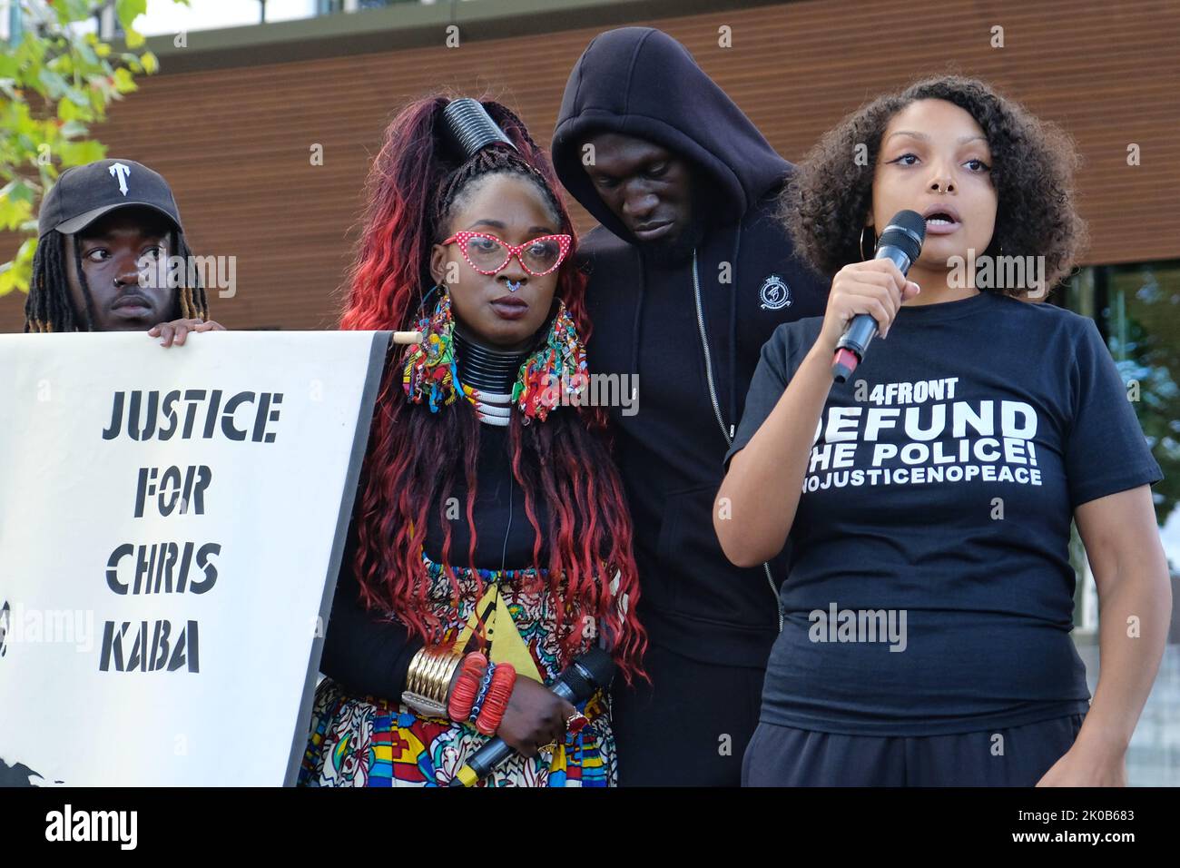 London, UK. 10th September, 2022. Singer Stormzy stands with activists Marvina Newton (L) and Temi Mwale (R). Hundreds of Black Lives Matters protesters listen to speakers outside New Scotland Yard. The demonstrators marched from Parliament Square to the police HQ calling for justice following a fatal police shooting of father-to-be Chris Kaba, an unarmed black man, last Monday in south London.  The IOPC are treating the investigation as homicide. Credit: Eleventh Hour Photography/Alamy Live News Stock Photo