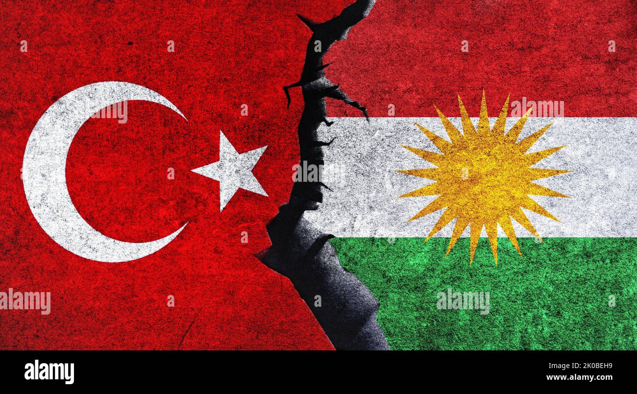 Turkey vs Kurdistan flags on a wall with a crack. Kurdistan and Turkey