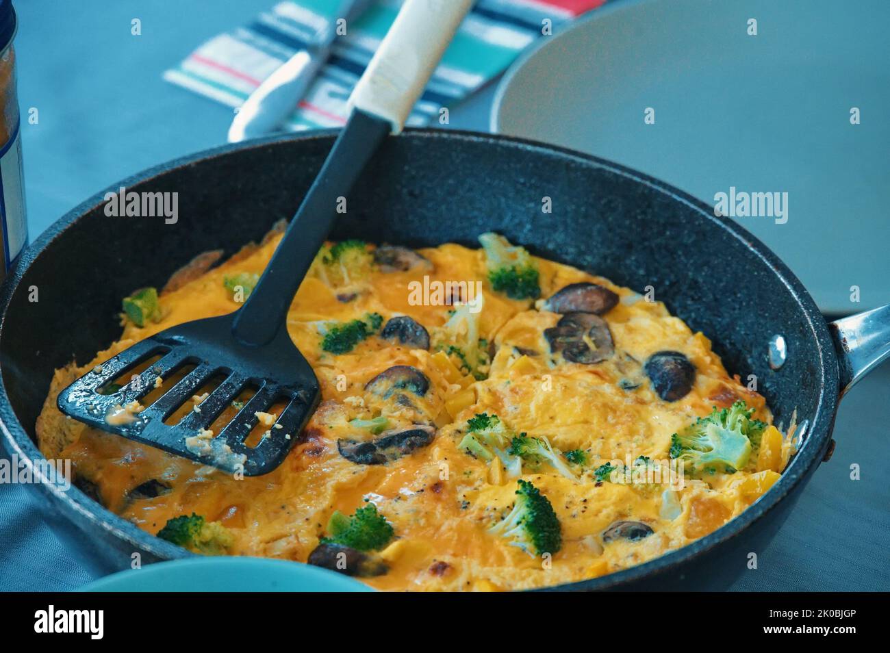 Closeup of freshly baked frittata on the table Stock Photo