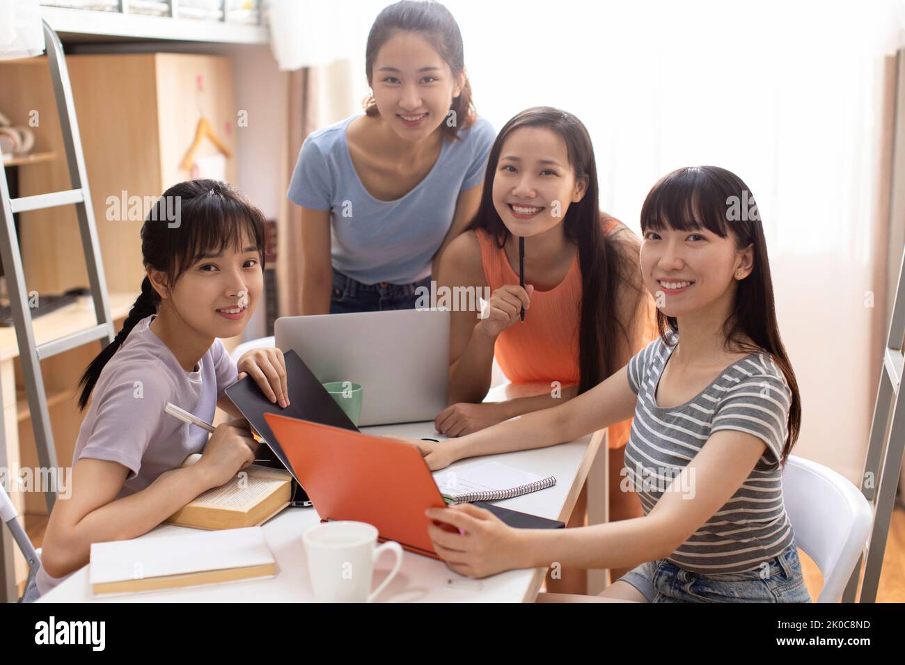 Young Chinese university students learning in dormitory Stock Photo - Alamy