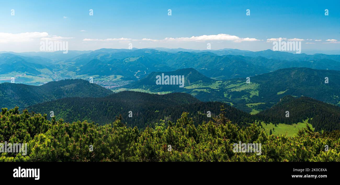 Velka Fatra and westernmost part of Low Tatras mountains from Velky Choc hill summit in Chocske vrchy mountains in Slovakia Stock Photo