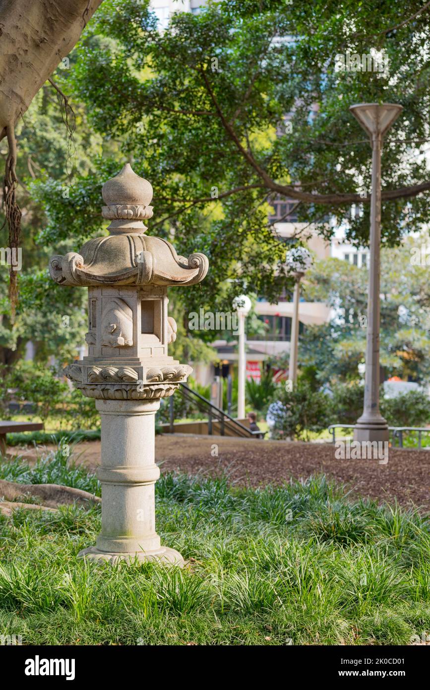 One of the lanterns provided by the city of Nagoya to its sister city, Sydney in 1983 now sits in the Nagoya Gardens in Hyde Park in Sydney, Australia Stock Photo