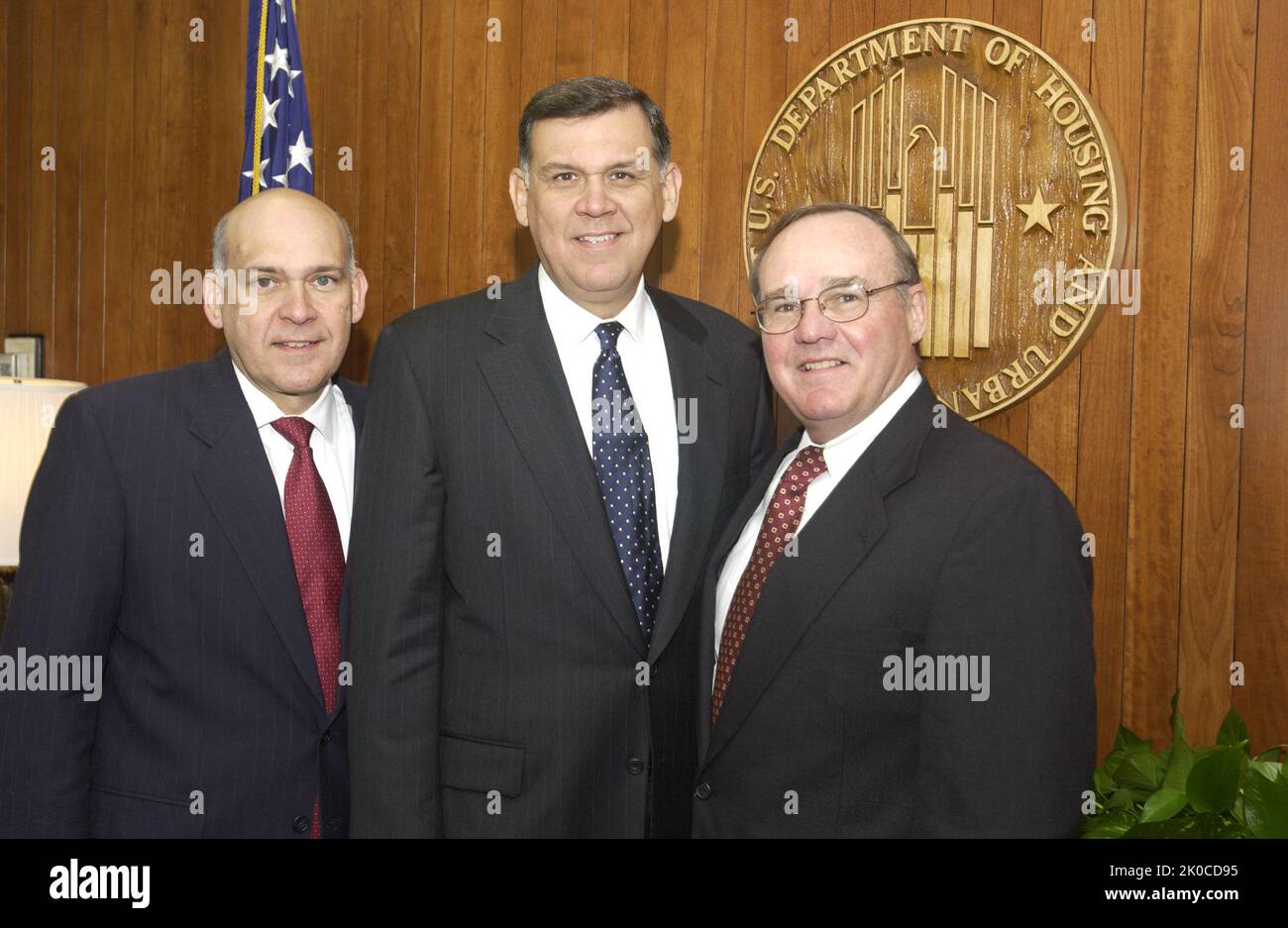 Secretary Martinez with Rafael Martinez and John McEwan II. Secretary