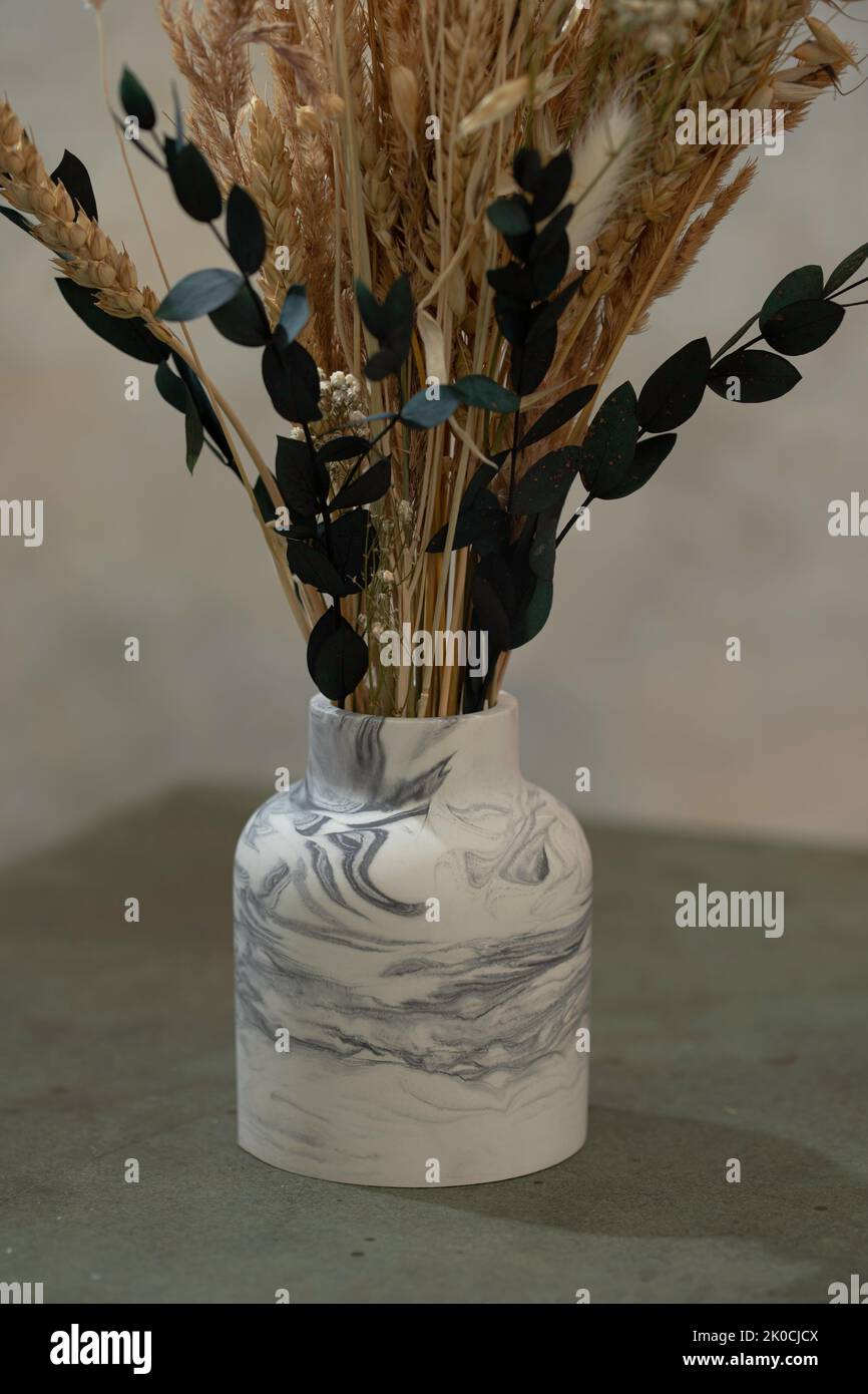 Fresh Look at Green Vase Made Of Plaster With Bouquet Of Stabilized Lavender