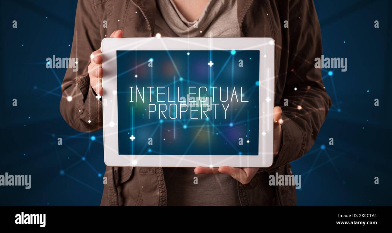 Person holding tablet, security concept Stock Photo
