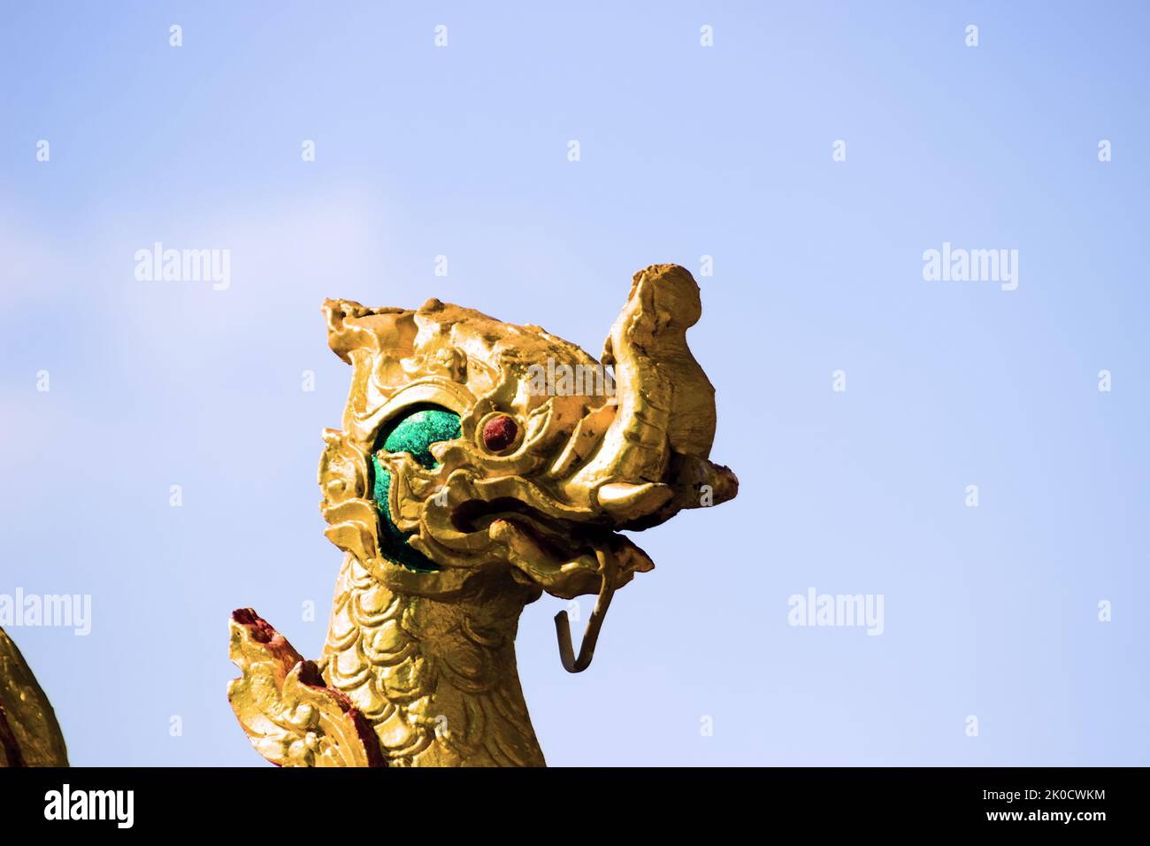 Elements of Thai Temple sculpture dragon, threefaced janus, samsara