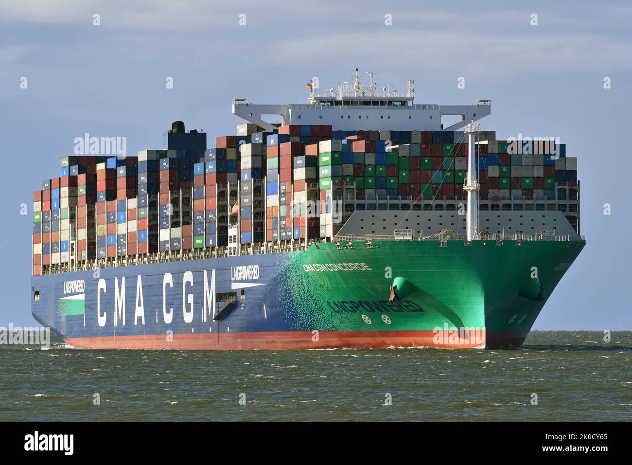 Megamax Containership CMA CGM CONCORCE passing Cuxhaven inbound for Hamburg Stock Photo