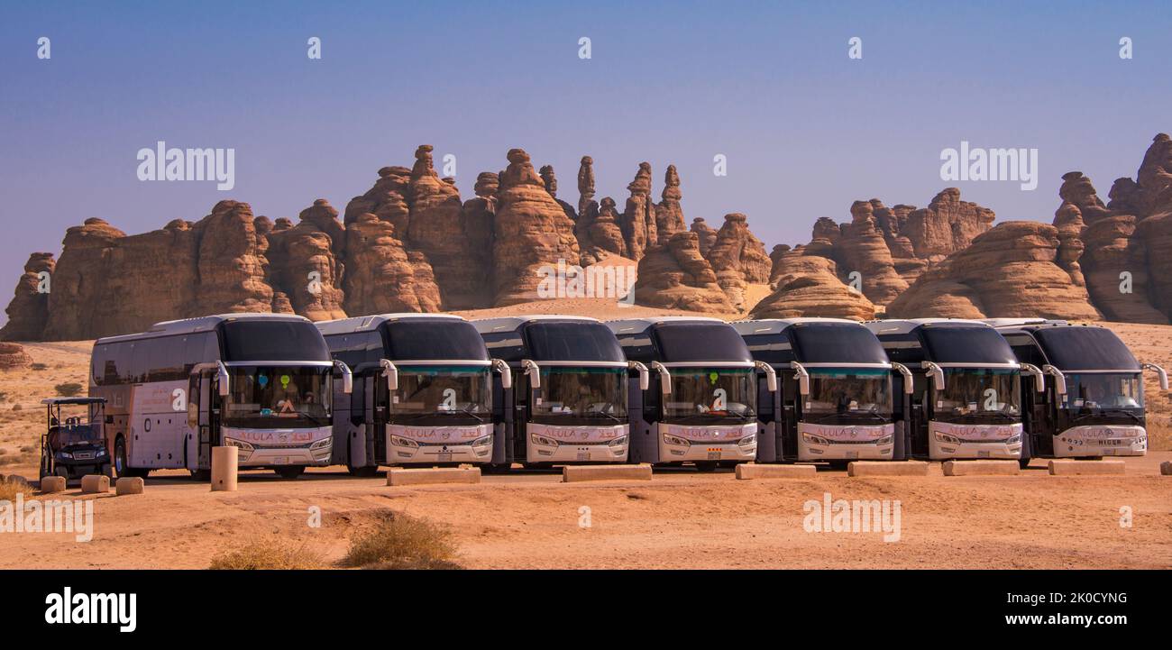 Tourist buses Hegra Saudi Arabia Stock Photo