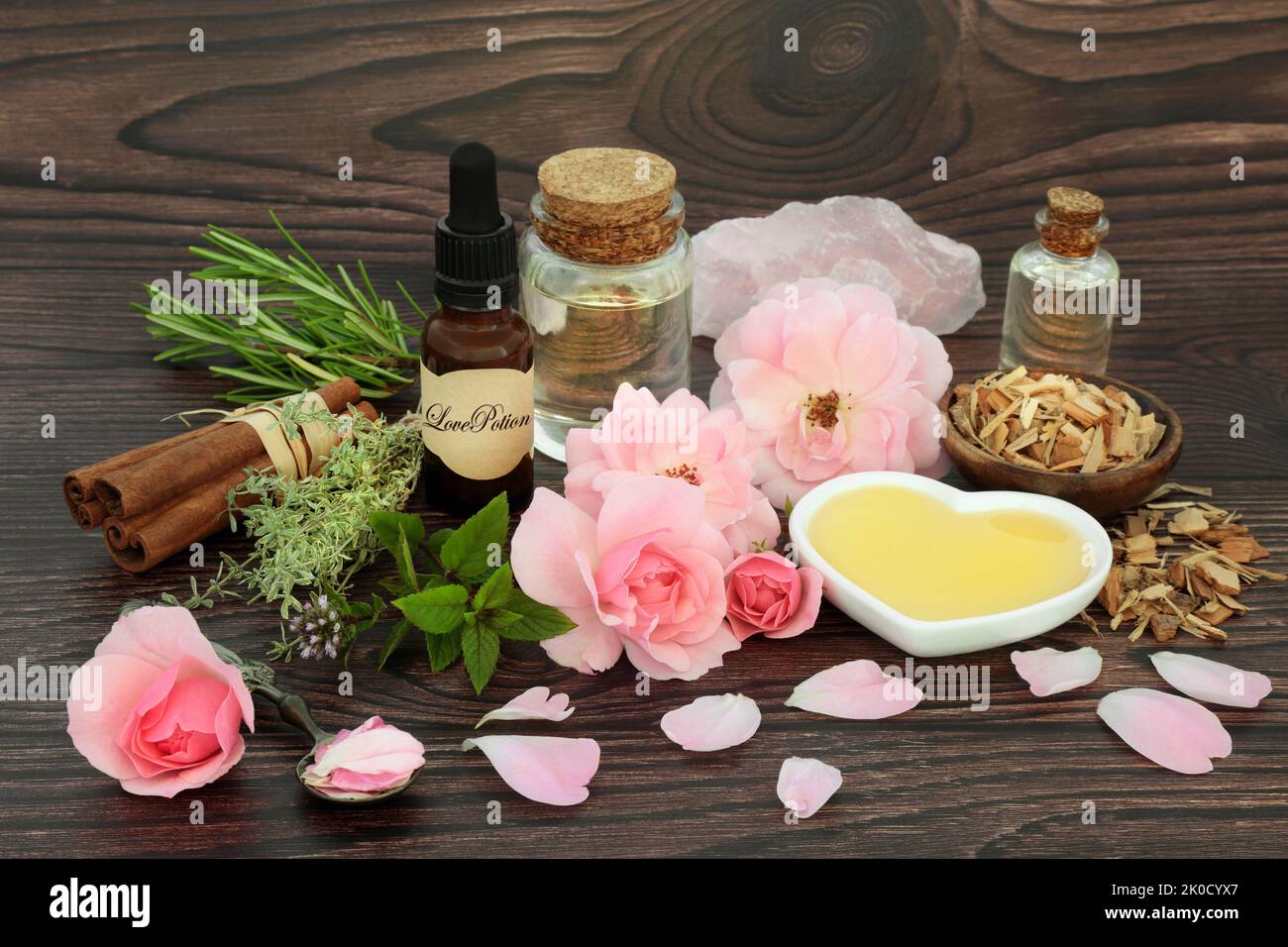 Mystical love potion and herbal and floral ingredients for magic spell